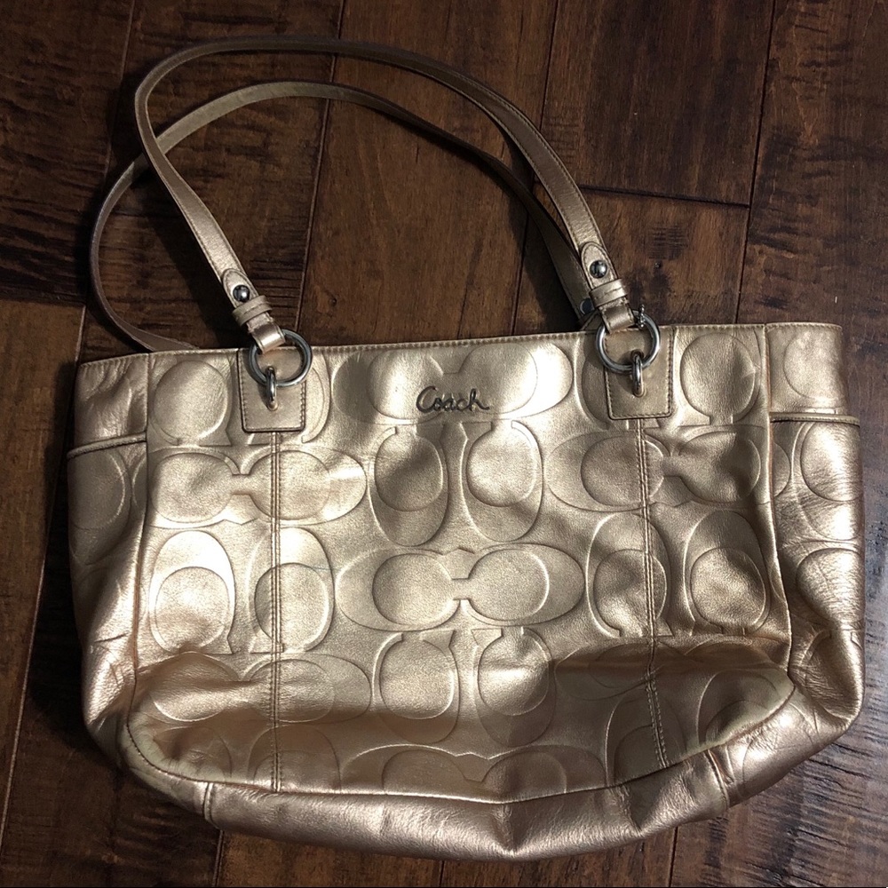 Gold coach purse